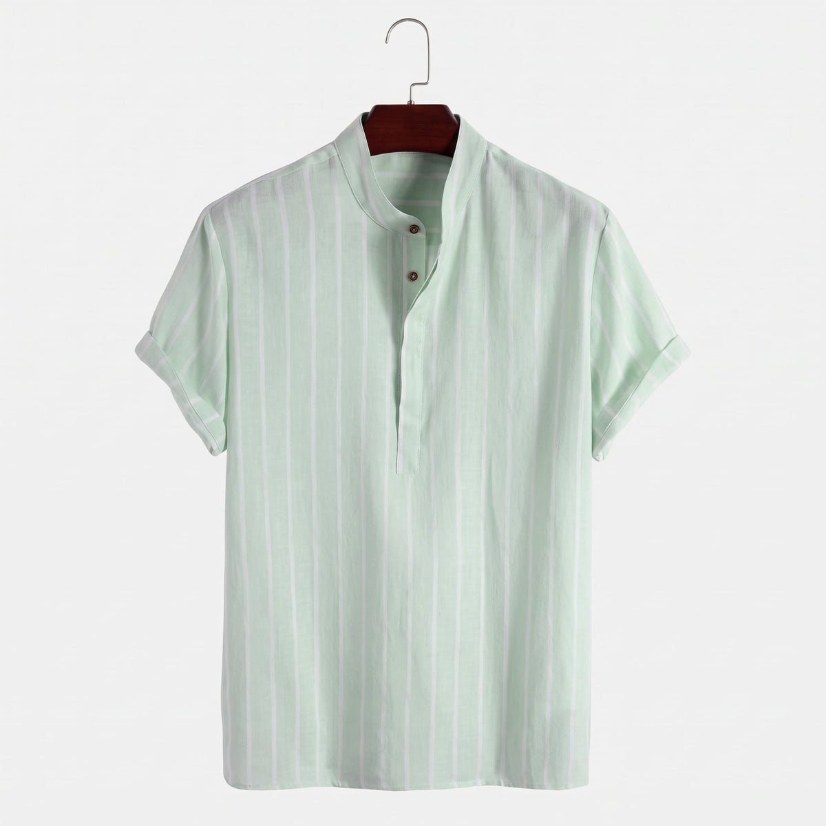 Colton Men's Linen Striped Short-Sleeve Shirt in Green on a wooden hanger against a pale wall