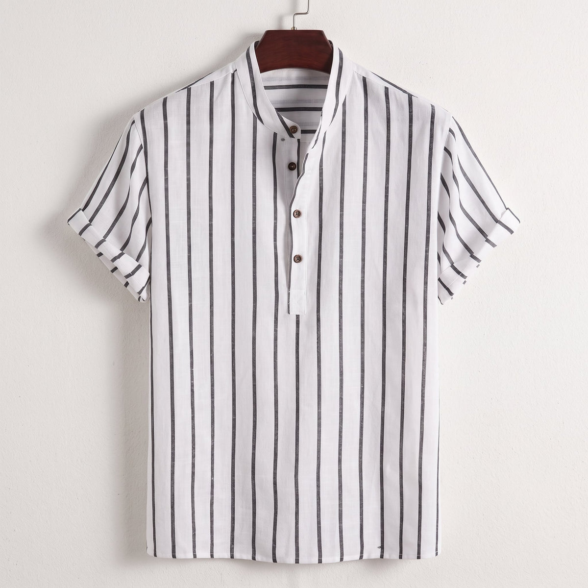 Colton Men's Linen Striped Short-Sleeve Shirt in White on a wooden hanger against a pale wall
