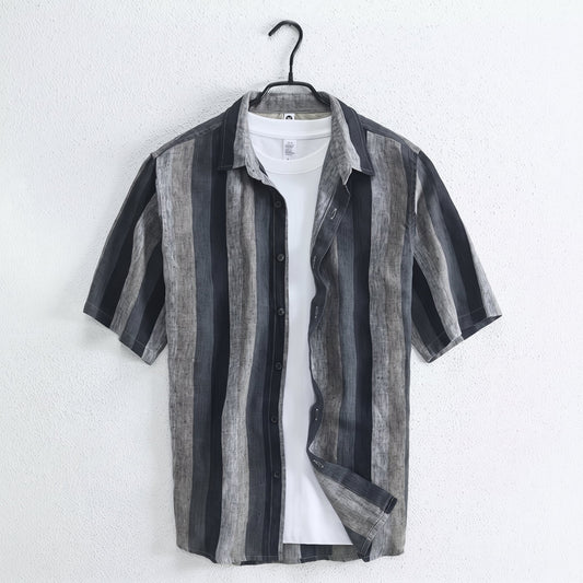 Cortez Men's Linen Button-Up Shirt hanging over a white top against a light wall