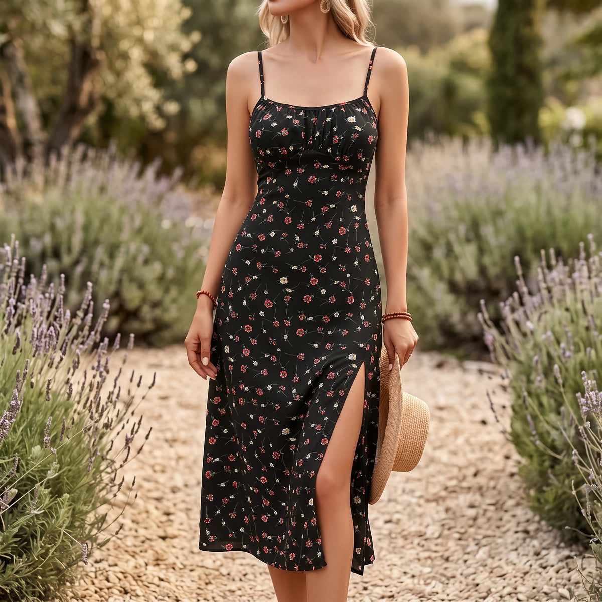 Dahlia Floral Spaghetti Strap Midi Dress worn on a sunlit garden path beside lavender