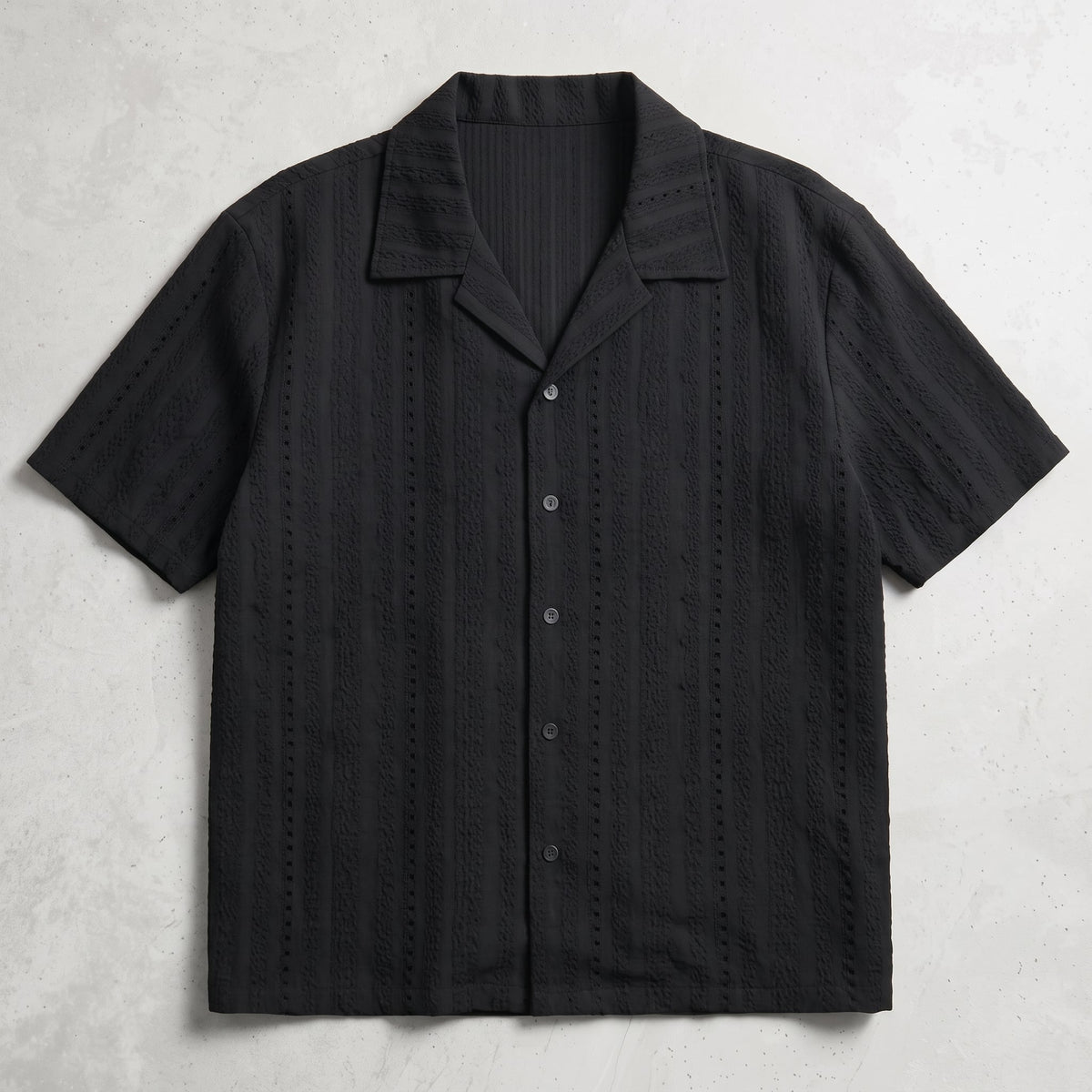 Kai Men's Mesh Camp Collar Shirt in Black against a light neutral background