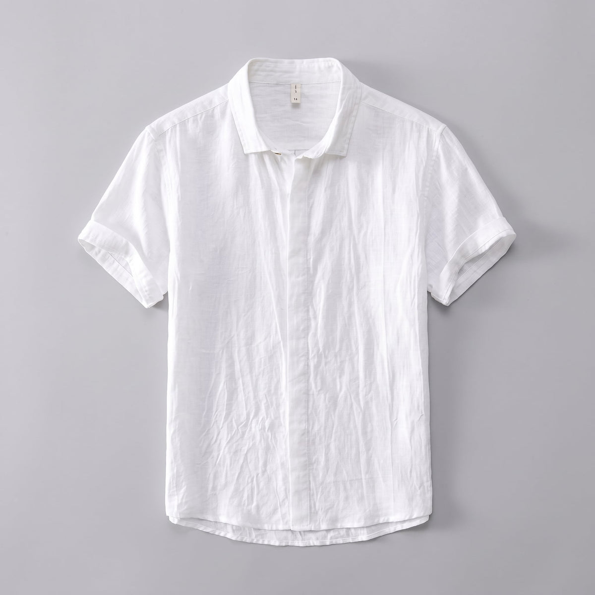 Kelso Men's Linen Button Up Shirt in White against a pale grey background