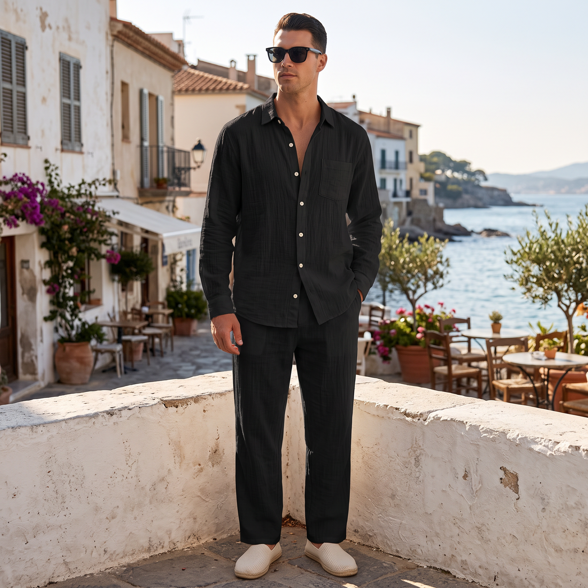 Lennox Men's Linen Blend Shirt and Trouser Set in black on a beachside town terrace